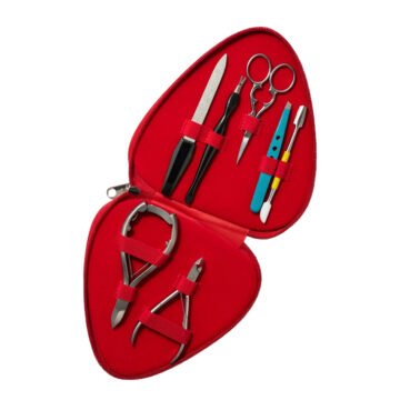 7-piece stainless steel manicure kit with nippers, scissors, file, and tweezers laid out